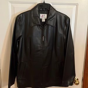 Leather coat, black, shoulder to hem 28”. Excellent condition.